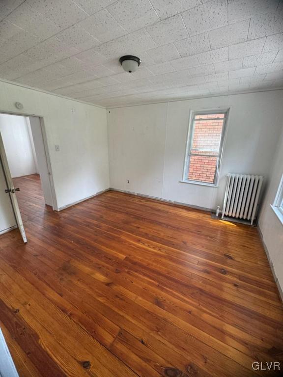 134 West Ridge Street Coaldale, PA 18218 - Photo 17 of 31 a view of an empty room with wooden floor and a window