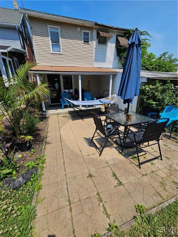 134 West Ridge Street Coaldale, PA 18218 - Photo 27 of 31 a view of a dinning tables and chairs in patio