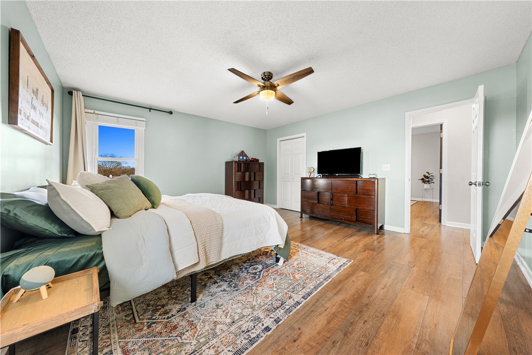 3067 Anderson Highway Liberty, SC 29657 - Photo 26 of 32 This spacious bedroom offers ample comfort and style for peaceful relaxation.