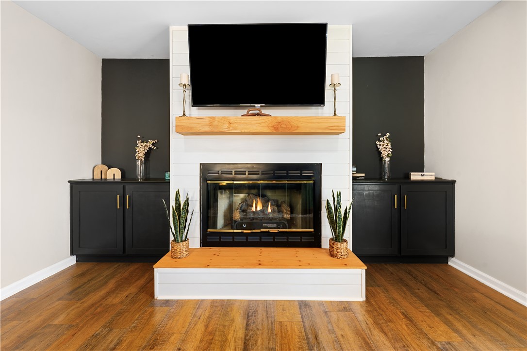 3067 Anderson Highway Liberty, SC 29657 - Photo 8 of 32 Warm and inviting living space with a stylish fireplace feature.