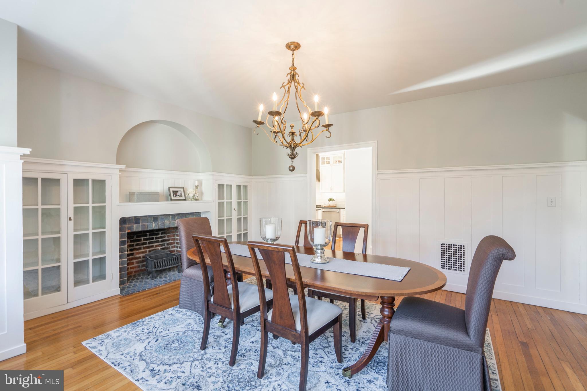 129 Valley Road Ardmore, PA 19003 - Photo 11 of 54 Dining Room with Built-Ins and Fireplace