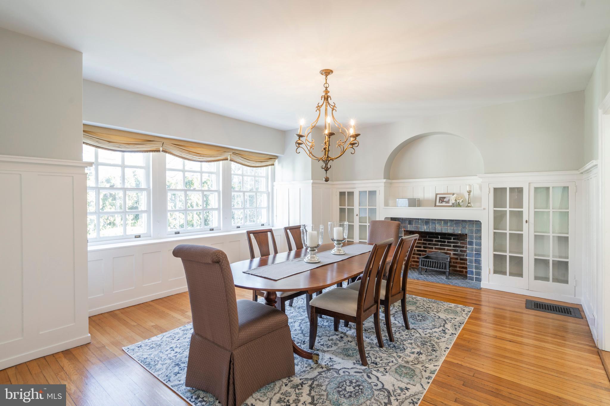 129 Valley Road Ardmore, PA 19003 - Photo 10 of 54 Dining Room with Built-Ins and Fireplace