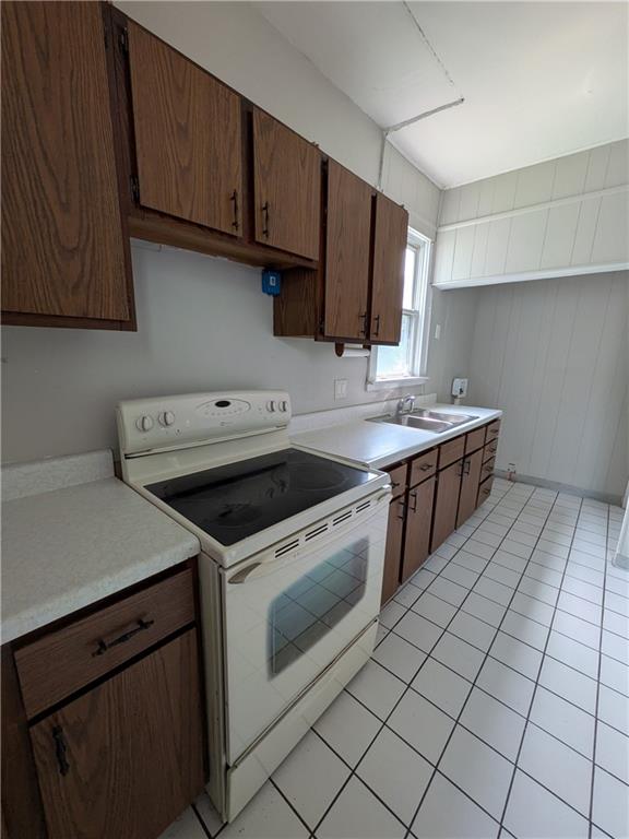 508 Electric Street New Castle, PA 16101 - Photo 5 of 14 a kitchen with a sink stove and cabinets