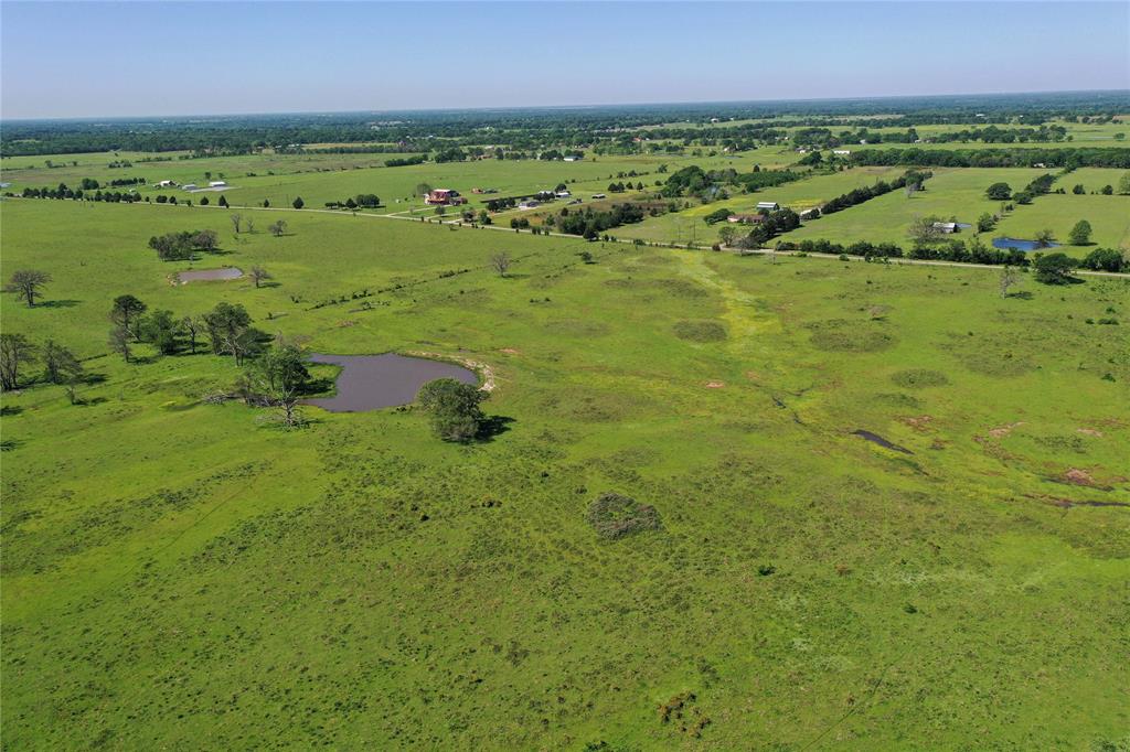0 County Road 2421 Mabank, TX 75156 - Photo 5 of 29 a view of a lush green outdoor space with a lake view and mountain view
