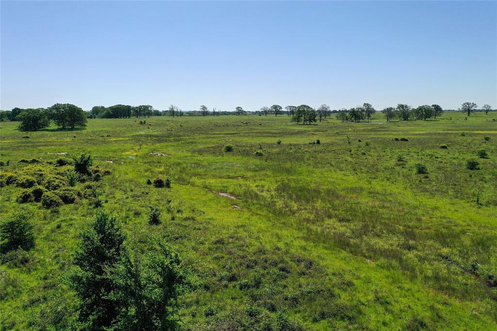 0 County Road 2421 Mabank, TX 75156 - Photo 9 of 29 a view of a field with an outdoor space and seating