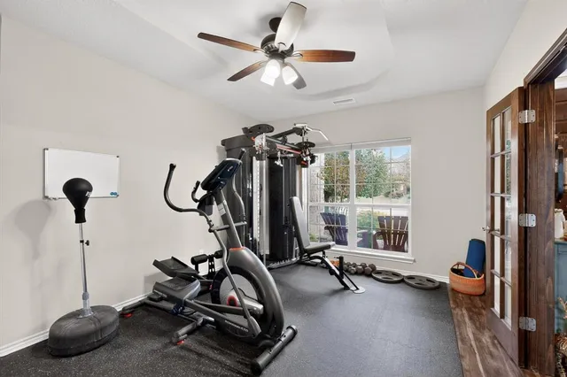 a view of a room with gym equipment