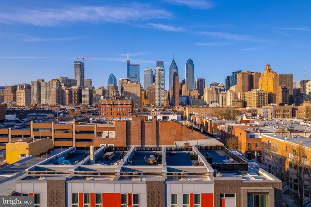 a view of a city with tall buildings