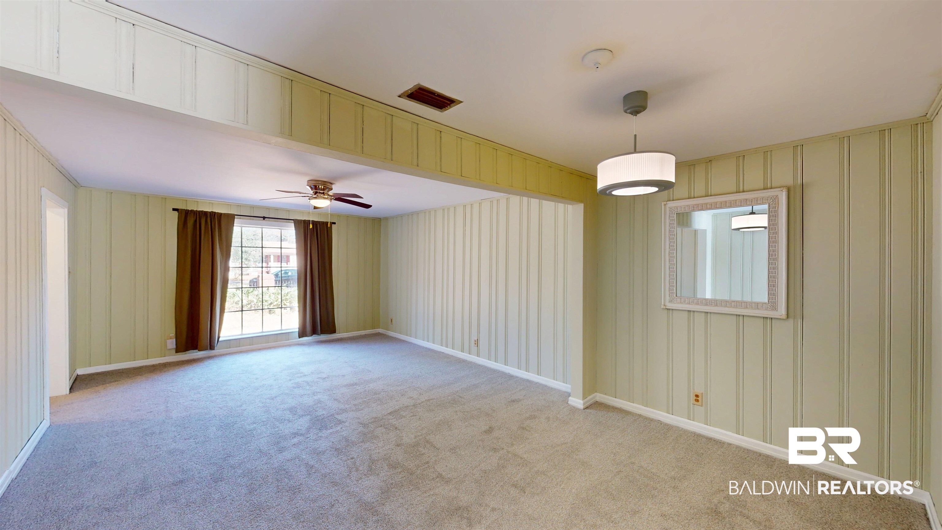 1471 Cedar Crescent Drive Mobile, AL 36605 - Photo 7 of 28 Spare room featuring light colored carpet and a ceiling fan