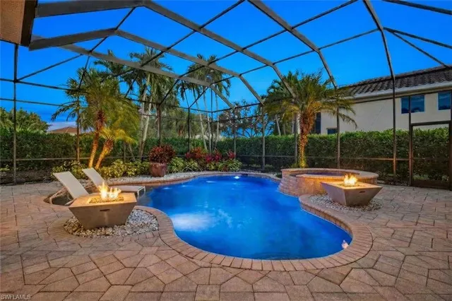 a outdoor space with swimming pool and furniture