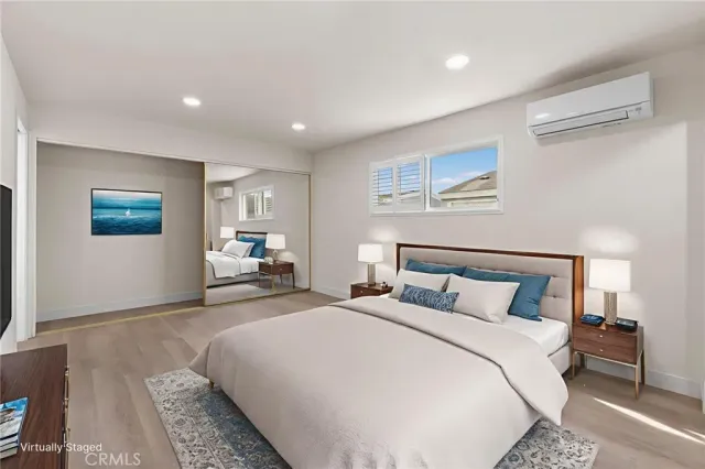 a bathroom with a double vanity sink toilet and shower