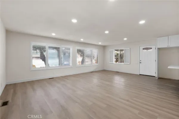 a view of livingroom with stairs and furniture