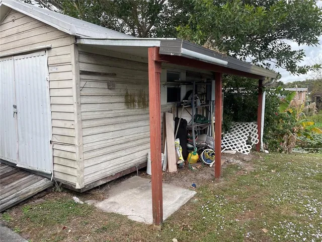 a view of a bench in a backyard