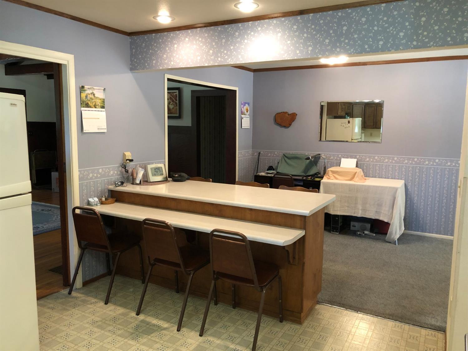 2368 Upper River Road Grants Pass, OR 97526 - Photo 5 of 30 a dining room with a table and chairs