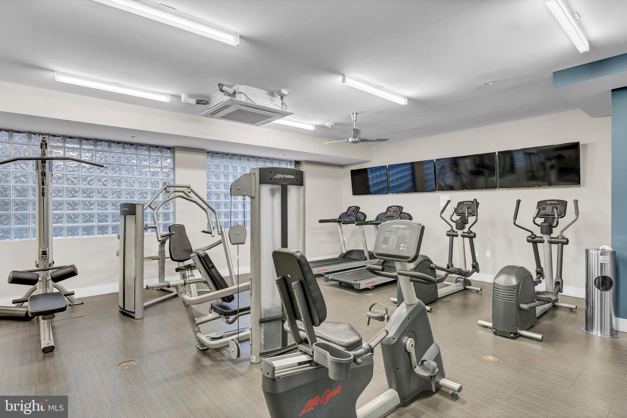 1320 Fenwick Lane, Unit 304 Silver Spring, MD 20910 - Photo 55 of 64 a view of a room with gym equipment