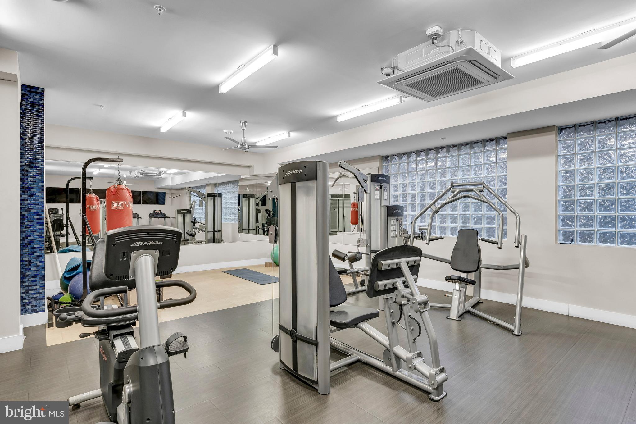 1320 Fenwick Lane, Unit 304 Silver Spring, MD 20910 - Photo 56 of 64 a view of a room with gym equipment