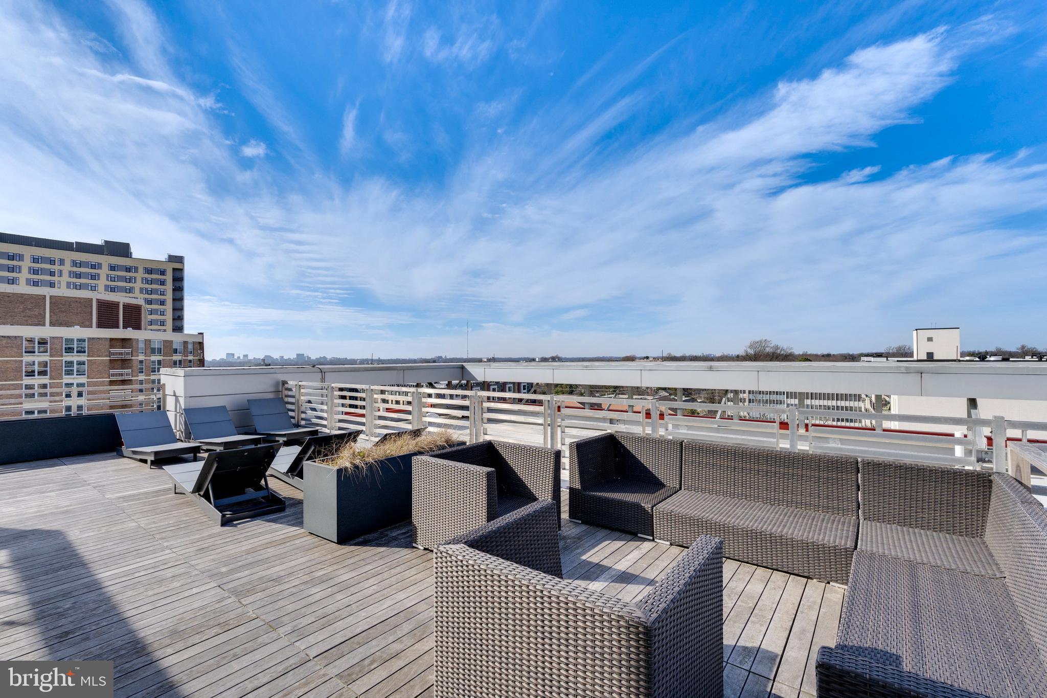 1320 Fenwick Lane, Unit 304 Silver Spring, MD 20910 - Photo 7 of 64 a view of a terrace with seating space