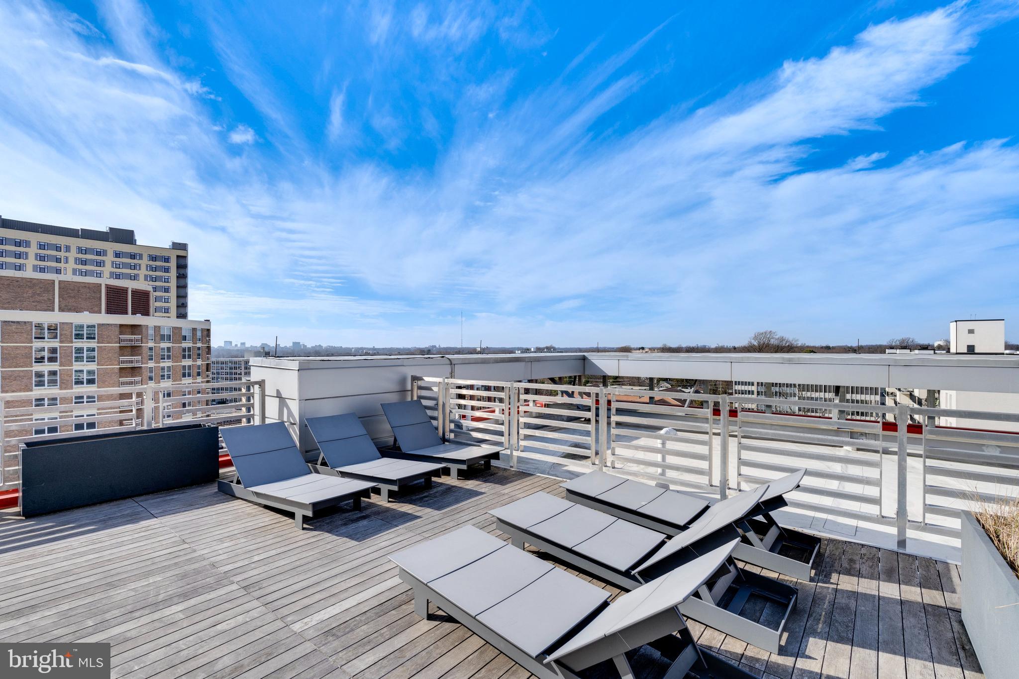 1320 Fenwick Lane, Unit 304 Silver Spring, MD 20910 - Photo 8 of 64 a view of a terrace with seating space