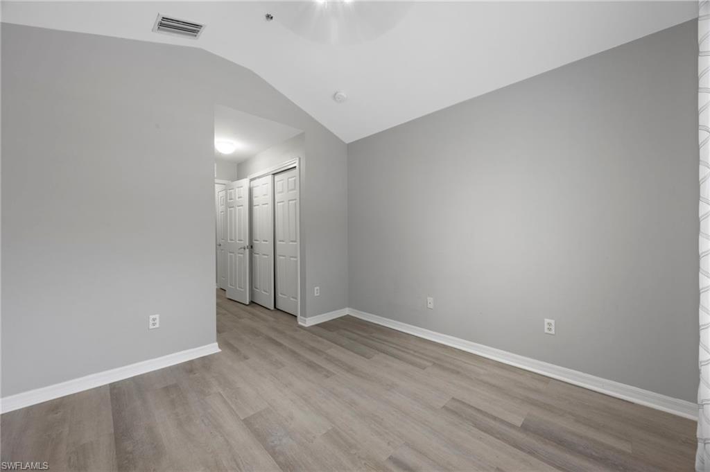 15930 Marcello Circle, Unit 242 Naples, FL 34110 - Photo 20 of 32 a view of an empty room