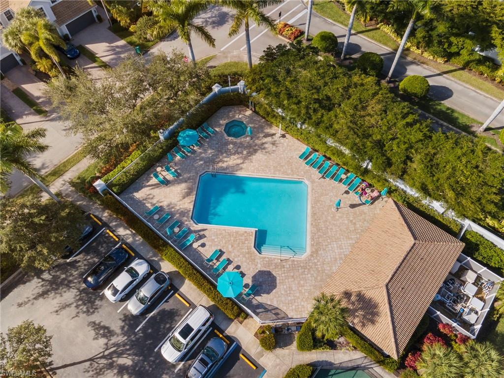 15930 Marcello Circle, Unit 242 Naples, FL 34110 - Photo 32 of 32 an aerial view of a house outdoor space and street view
