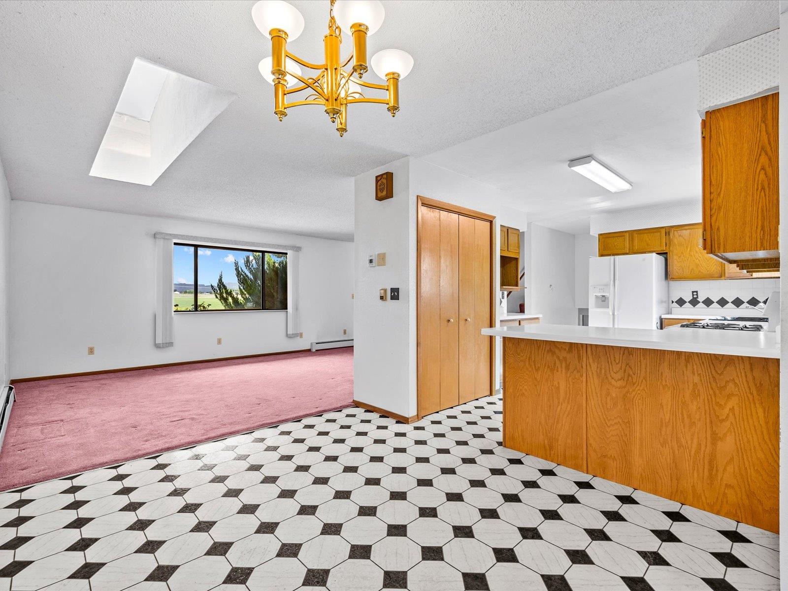 1425 19 Road Fruita, CO 81521 - Photo 14 of 42 a bedroom with a bed and a dresser