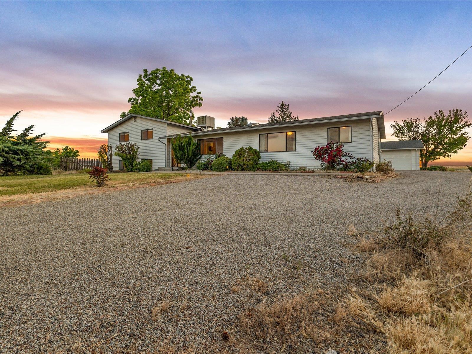 1425 19 Road Fruita, CO 81521 - Photo 2 of 42 a view of a house with a yard and street