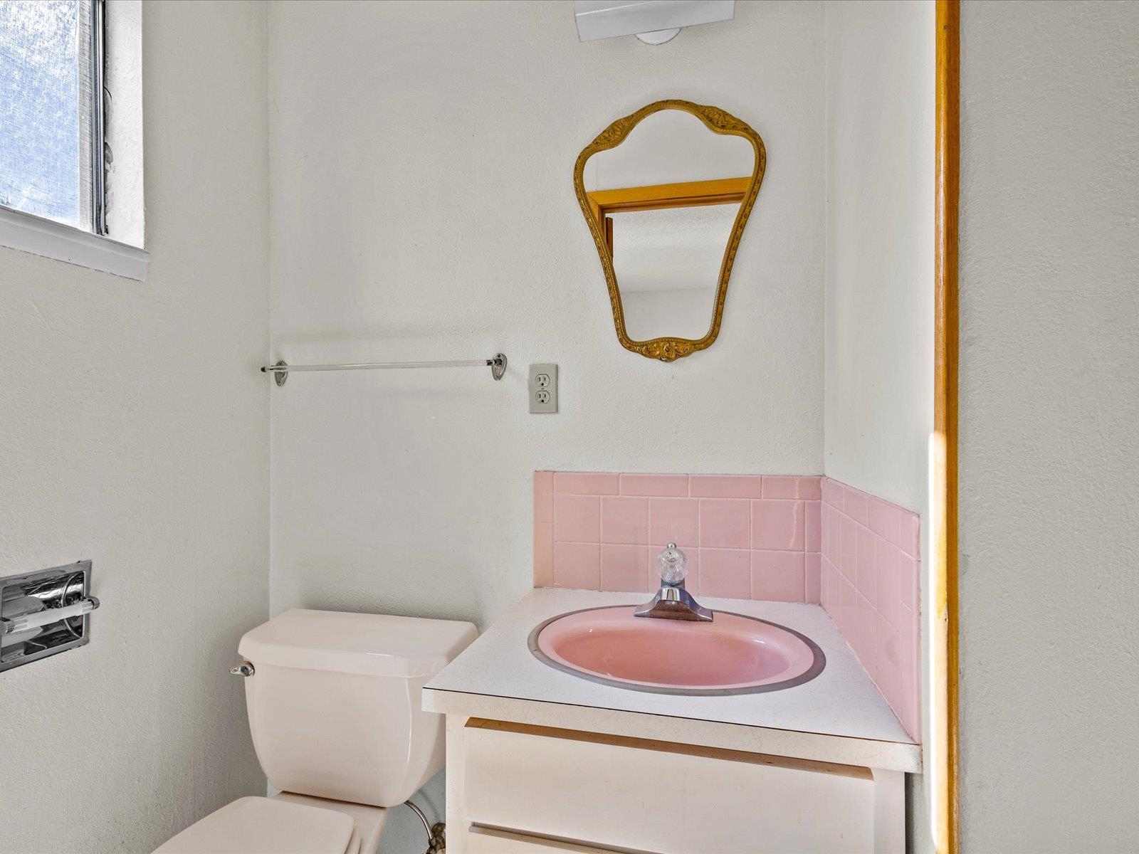 1425 19 Road Fruita, CO 81521 - Photo 31 of 42 a bathroom with a toilet sink and mirror