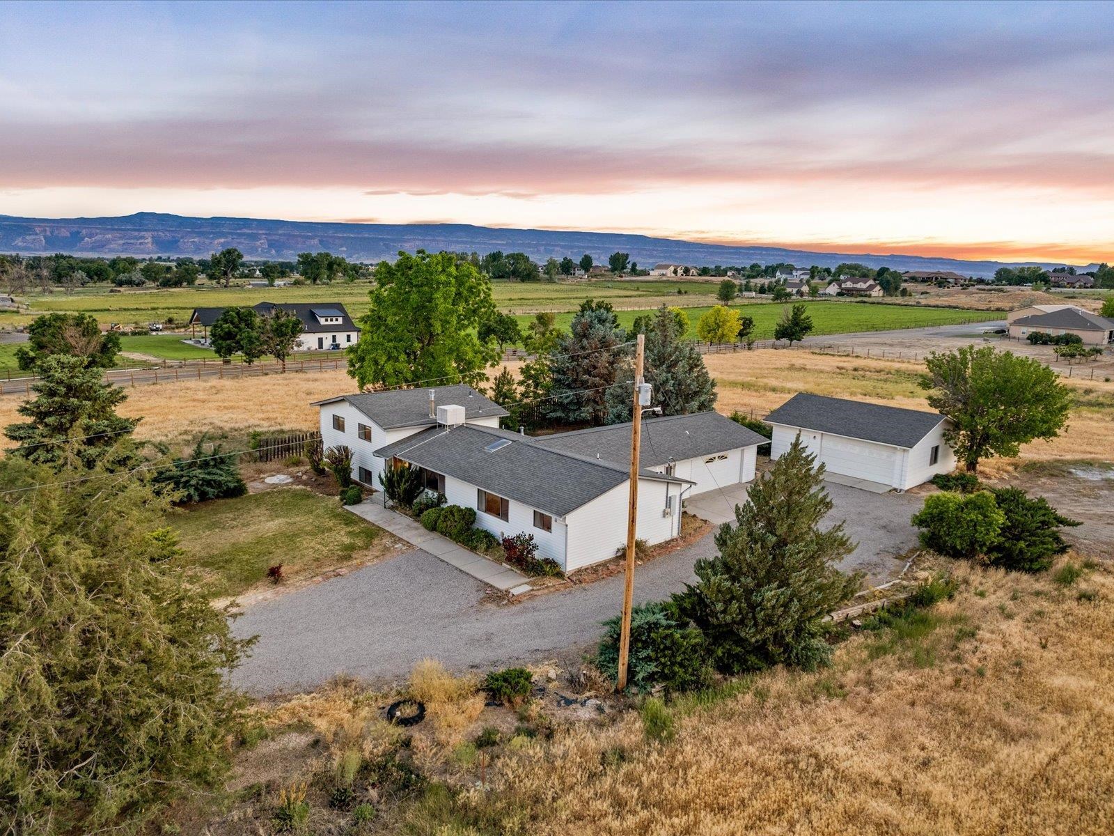 1425 19 Road Fruita, CO 81521 - Photo 5 of 42 a view of a lake with a city