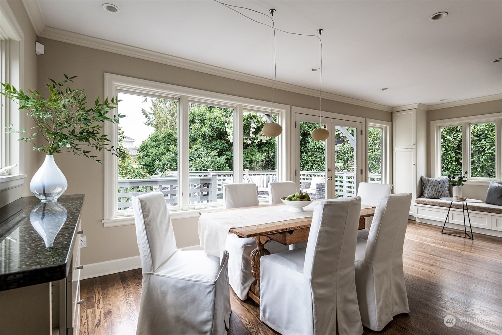 1206 37th Avenue East Seattle, WA 98112 - Photo 11 of 34 a dining room with furniture window and wooden floor