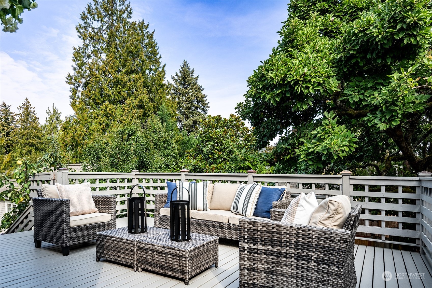 1206 37th Avenue East Seattle, WA 98112 - Photo 14 of 34 a view of a roof deck with couches and potted plants