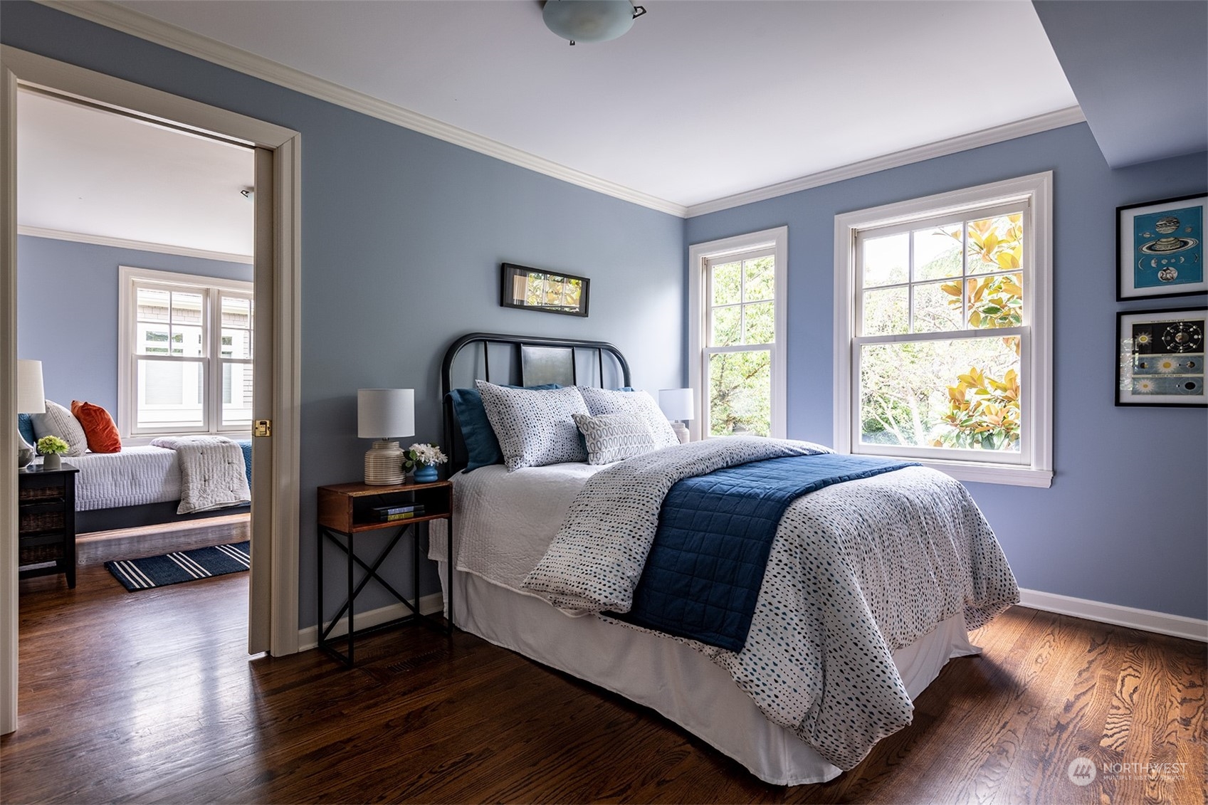 1206 37th Avenue East Seattle, WA 98112 - Photo 27 of 34 a bedroom with a bed a couch and a window