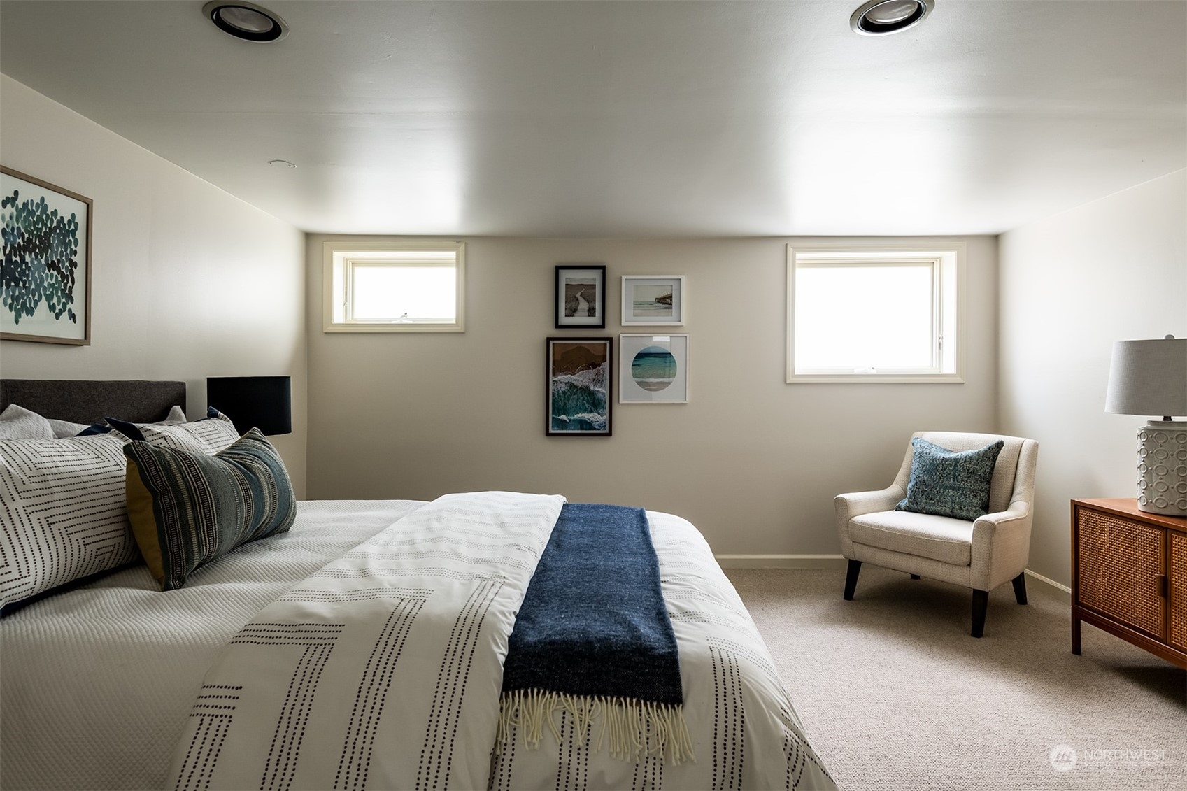 1206 37th Avenue East Seattle, WA 98112 - Photo 32 of 34 a bedroom with a bed and a couch