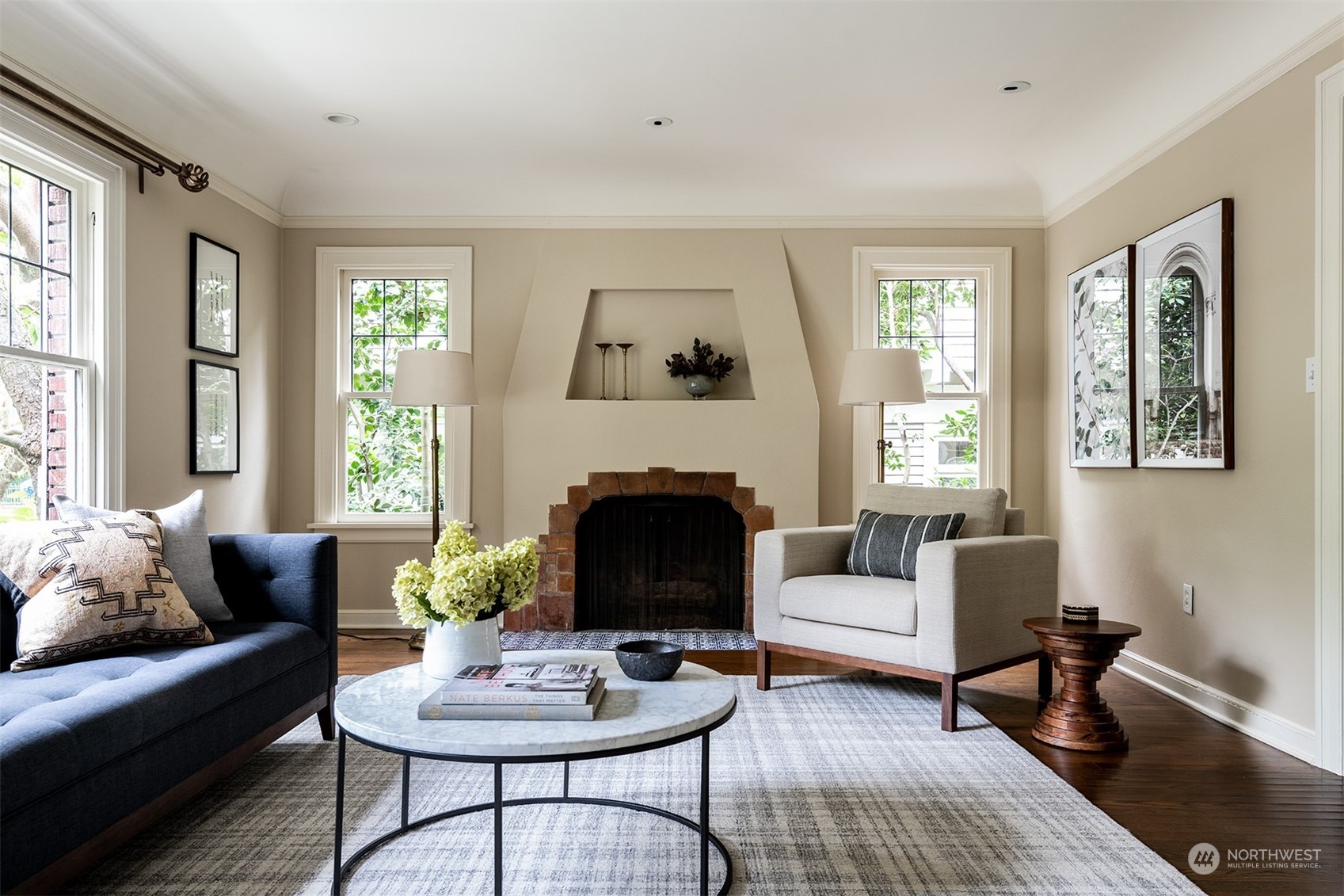 1206 37th Avenue East Seattle, WA 98112 - Photo 5 of 34 a living room with furniture and a fireplace