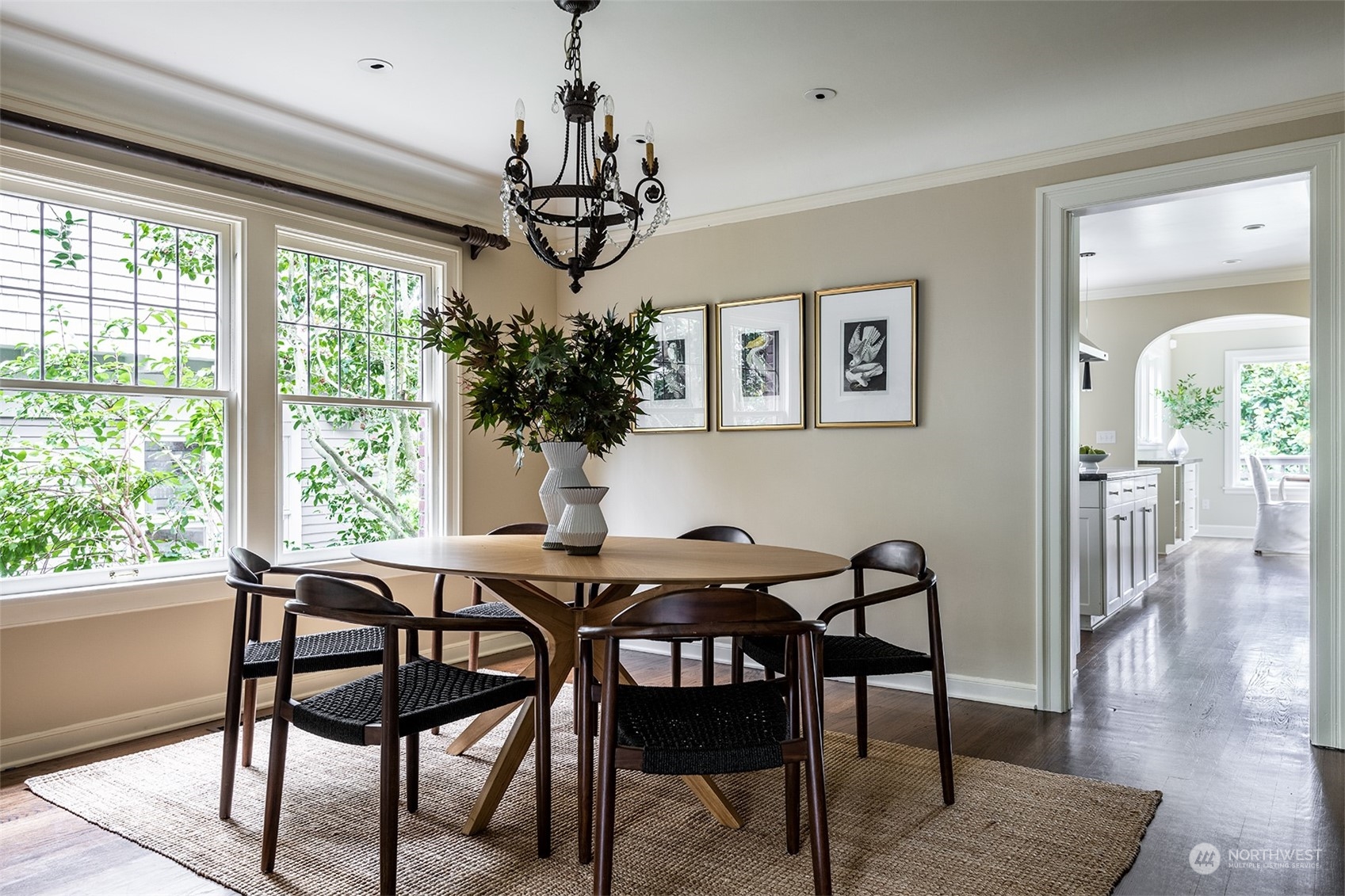 1206 37th Avenue East Seattle, WA 98112 - Photo 7 of 34 a view of a dining room with furniture window and wooden floor