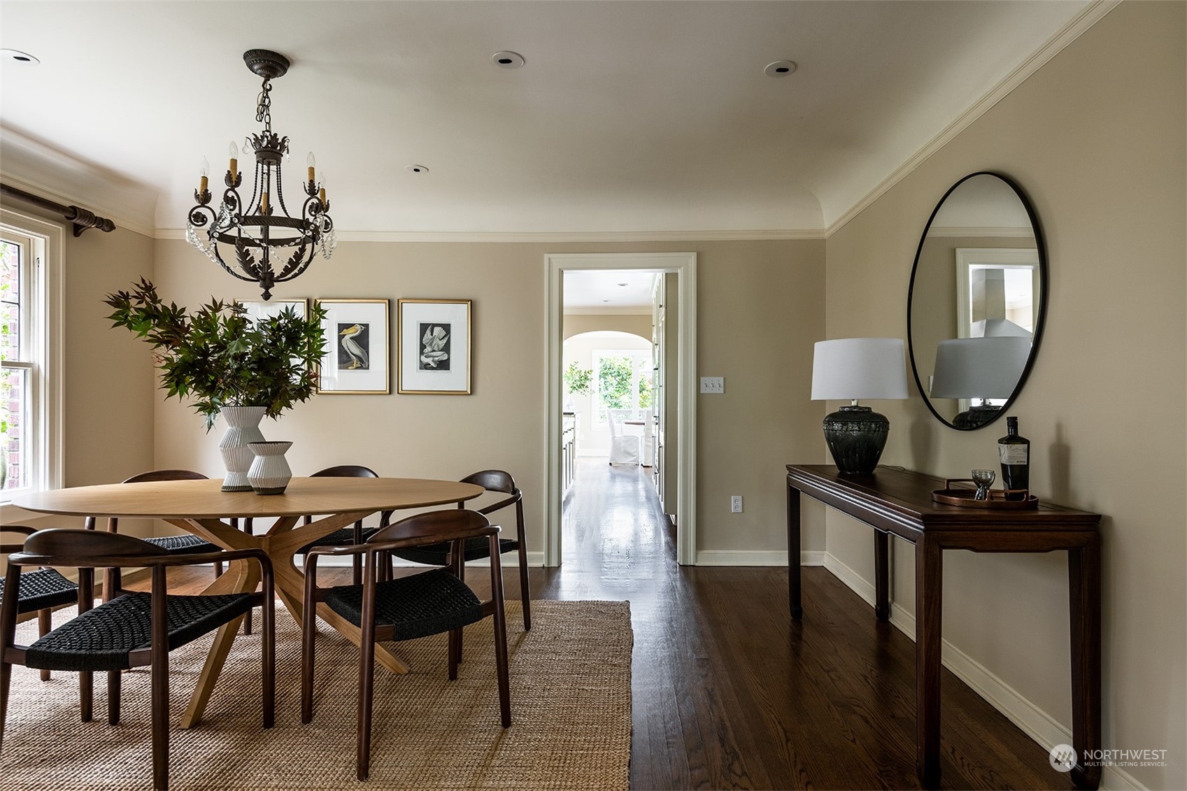 1206 37th Avenue East Seattle, WA 98112 - Photo 8 of 34 a view of a dining room with furniture and a chandelier