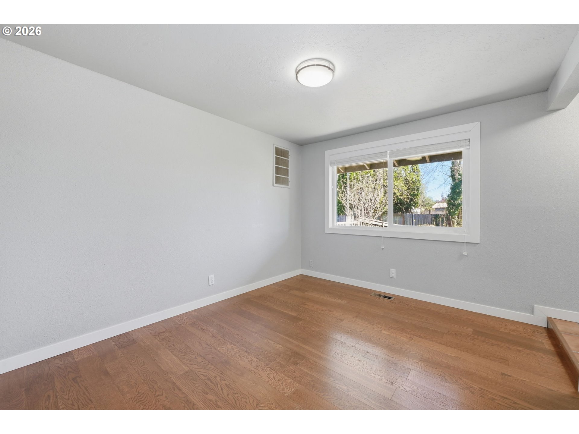 2612 Sage Street Eugene, OR 97404 - Photo 17 of 45 an empty room with windows
