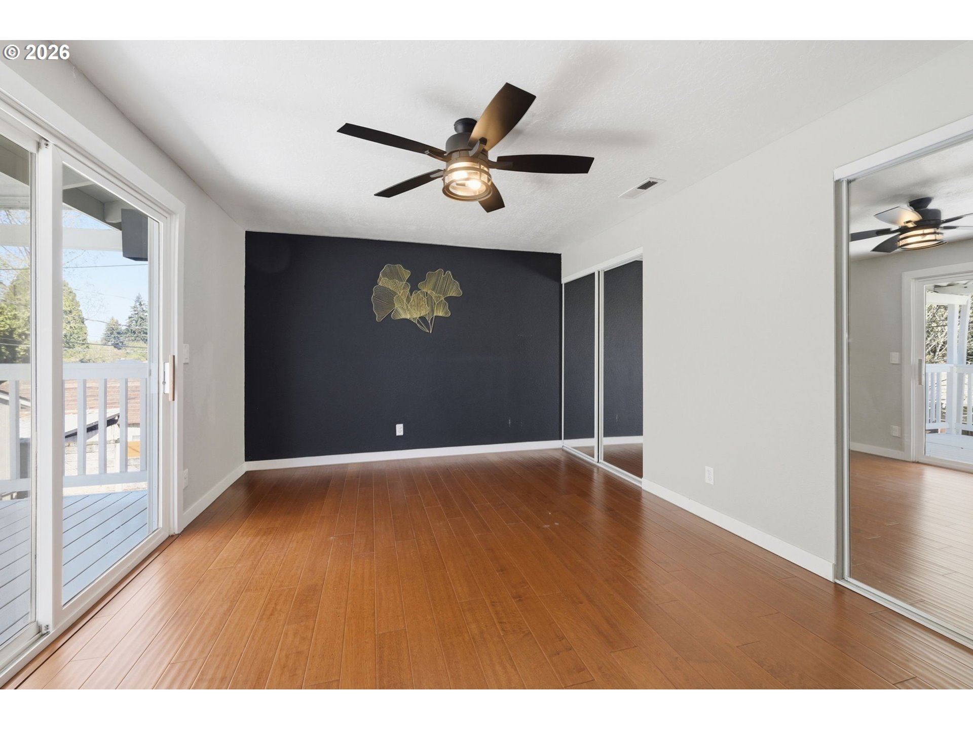 2612 Sage Street Eugene, OR 97404 - Photo 19 of 45 a view of an empty room with wooden floor