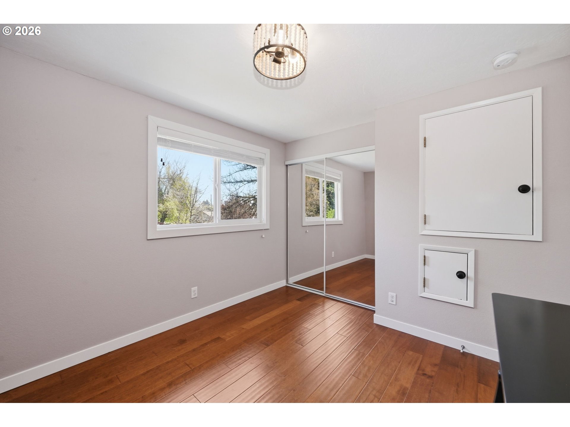 2612 Sage Street Eugene, OR 97404 - Photo 26 of 45 a view of empty room with wooden floor