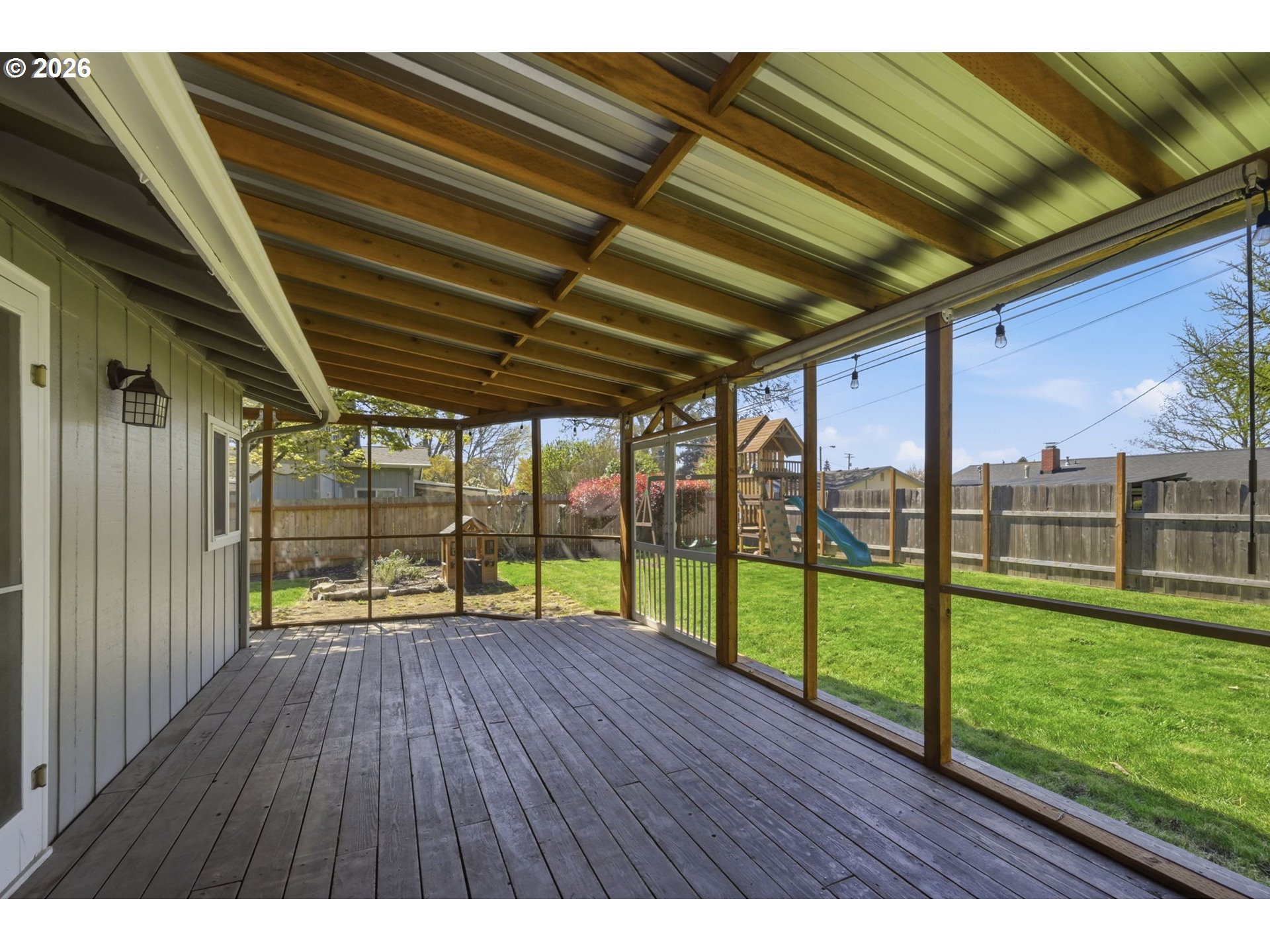 2612 Sage Street Eugene, OR 97404 - Photo 33 of 45 a view of porch with a backyard