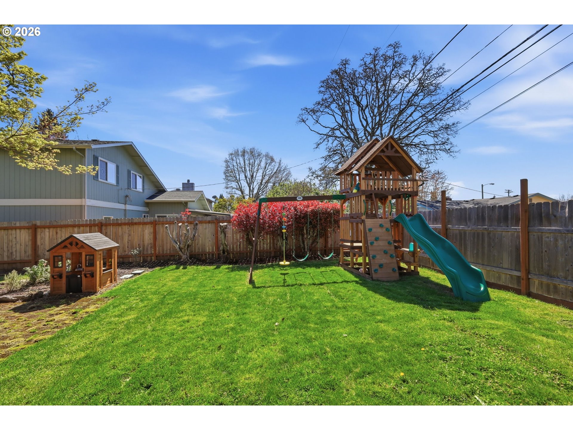 2612 Sage Street Eugene, OR 97404 - Photo 34 of 45 a view of a garden with a slide