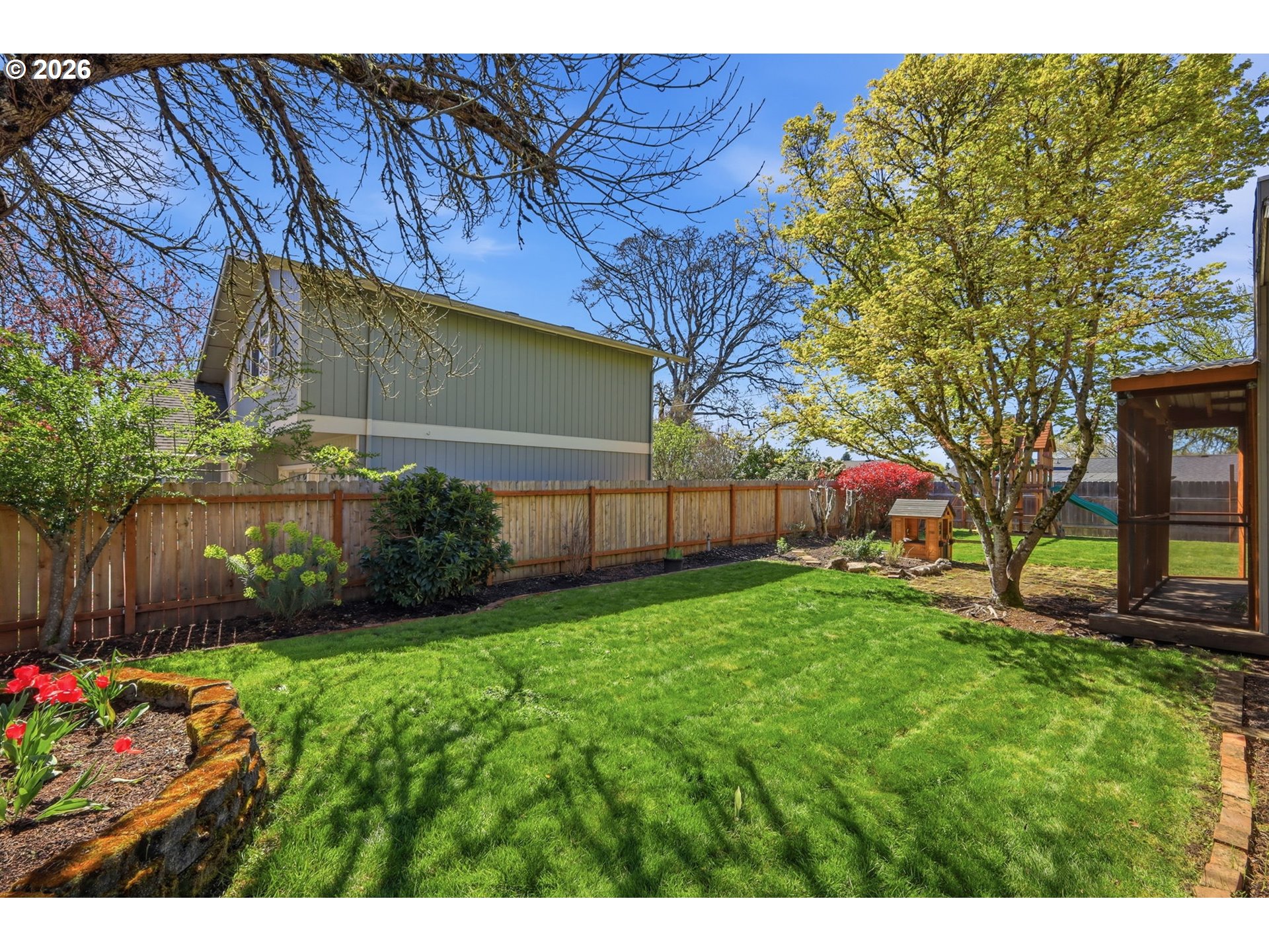 2612 Sage Street Eugene, OR 97404 - Photo 39 of 45 a view of backyard with garden and flowers