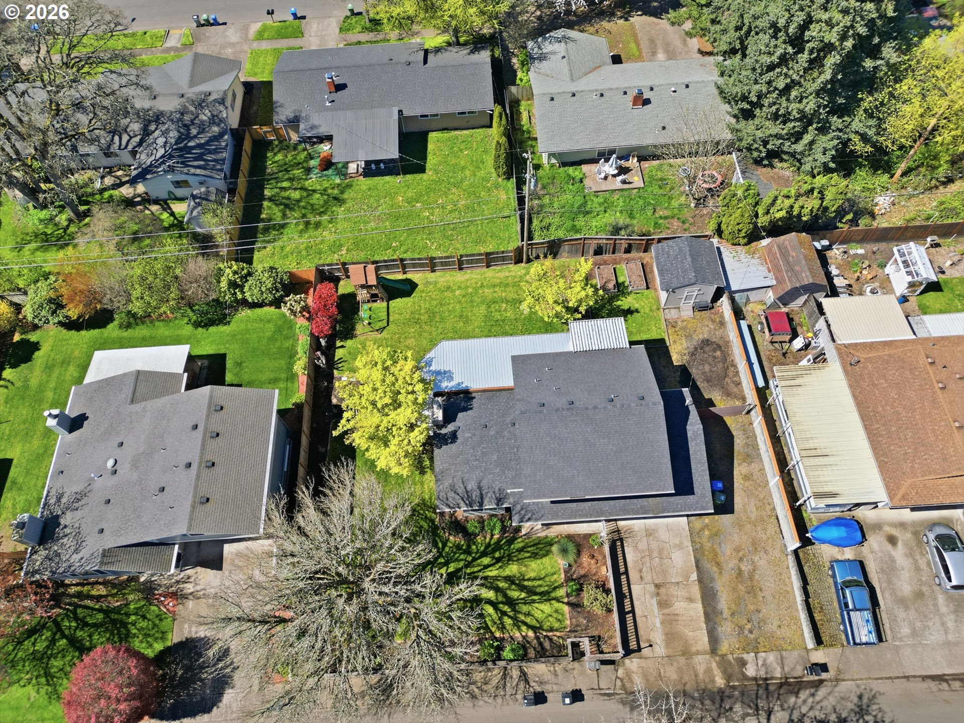 2612 Sage Street Eugene, OR 97404 - Photo 42 of 45 an aerial view of a house with a garden and a yard