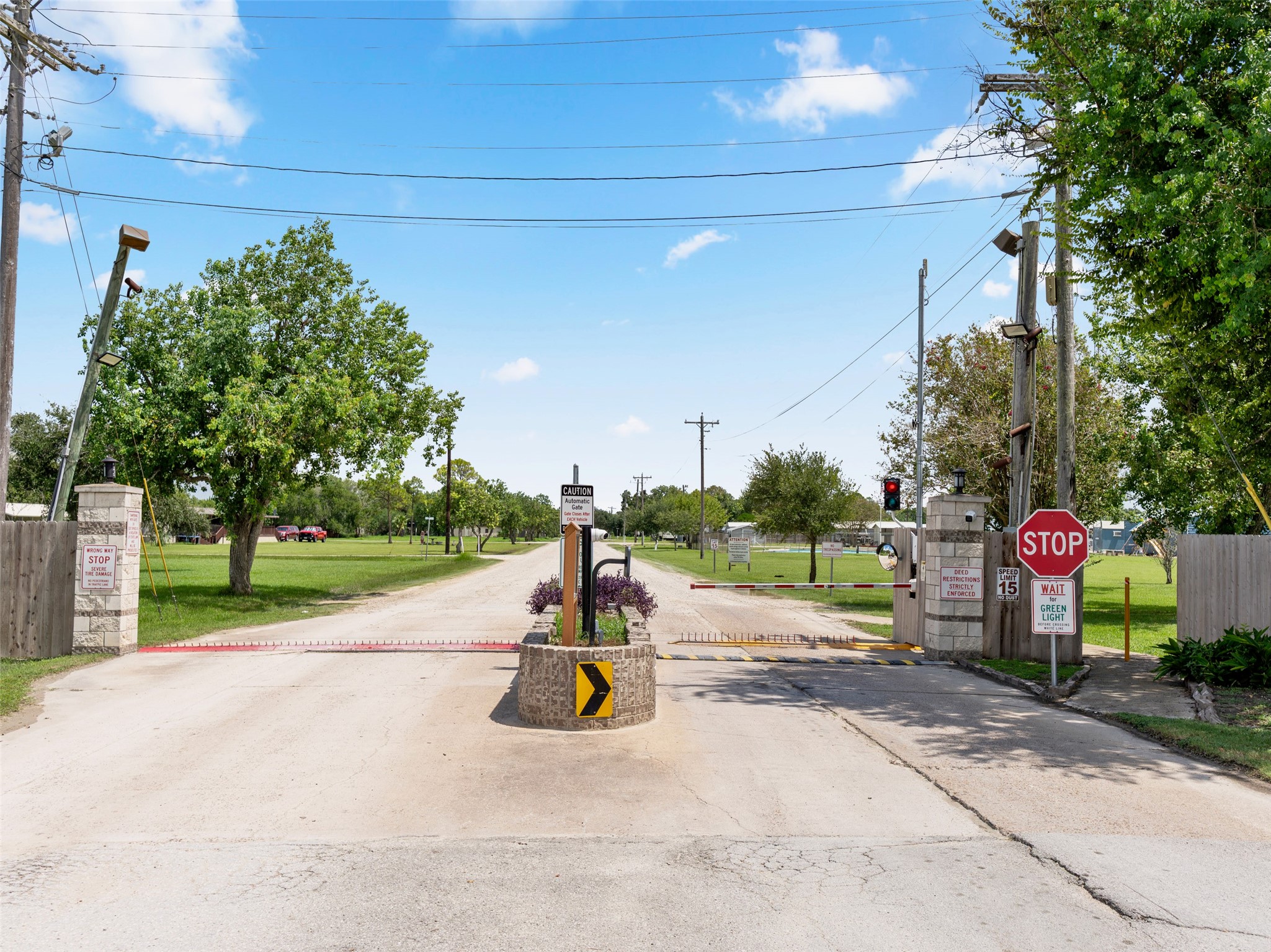 334 Old River Road North Palacios, TX 77465 - Photo 15 of 15 a park view with a bench and trees