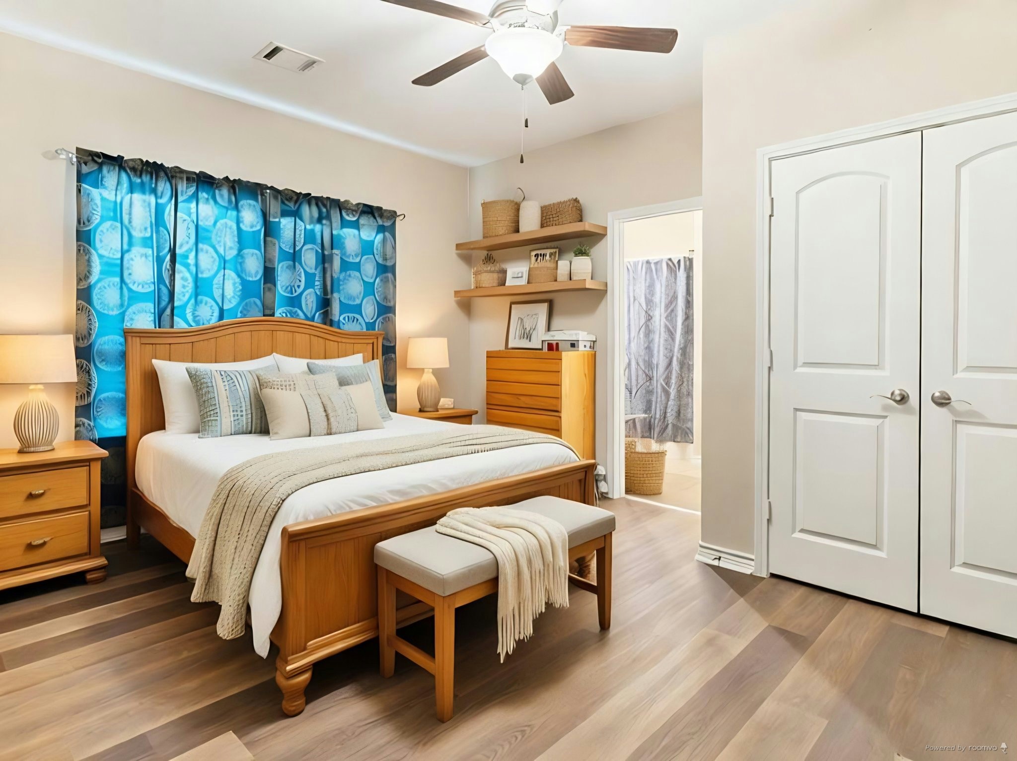 334 Old River Road North Palacios, TX 77465 - Photo 4 of 15 a bedroom with a large bed and a chandelier