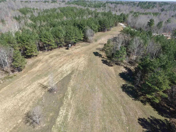 a view of a road with a yard