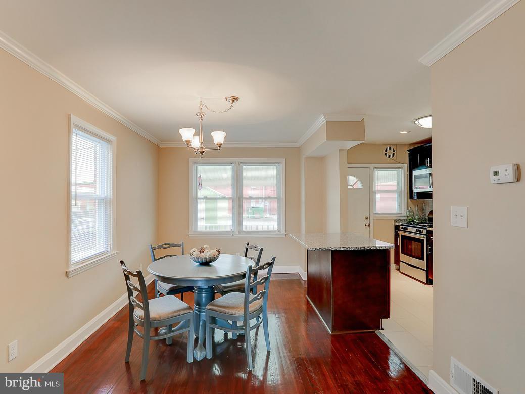 51 Hawthorne Road Middle River, MD 21220 - Photo 2 of 30 a view of a dining room with furniture and wooden floor