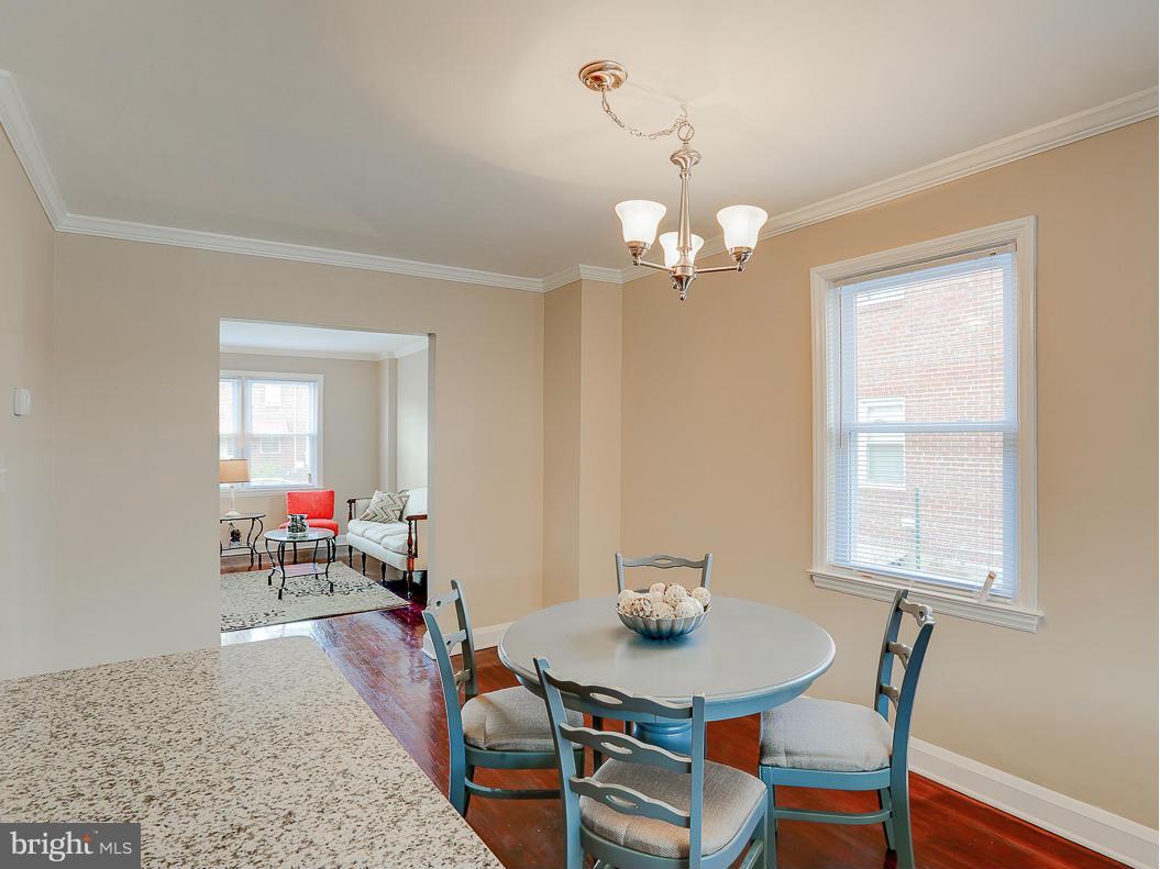 51 Hawthorne Road Middle River, MD 21220 - Photo 16 of 30 a view of a dining room with furniture and wooden floor