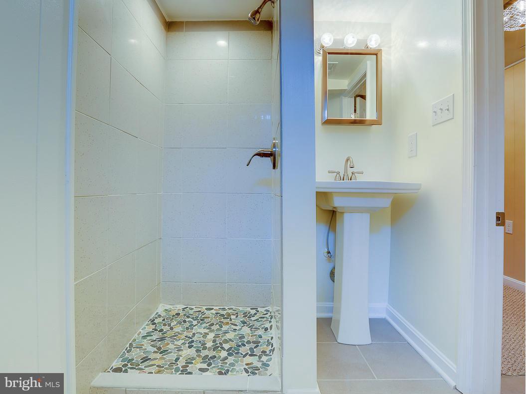 51 Hawthorne Road Middle River, MD 21220 - Photo 20 of 30 a bathroom with a sink and a mirror