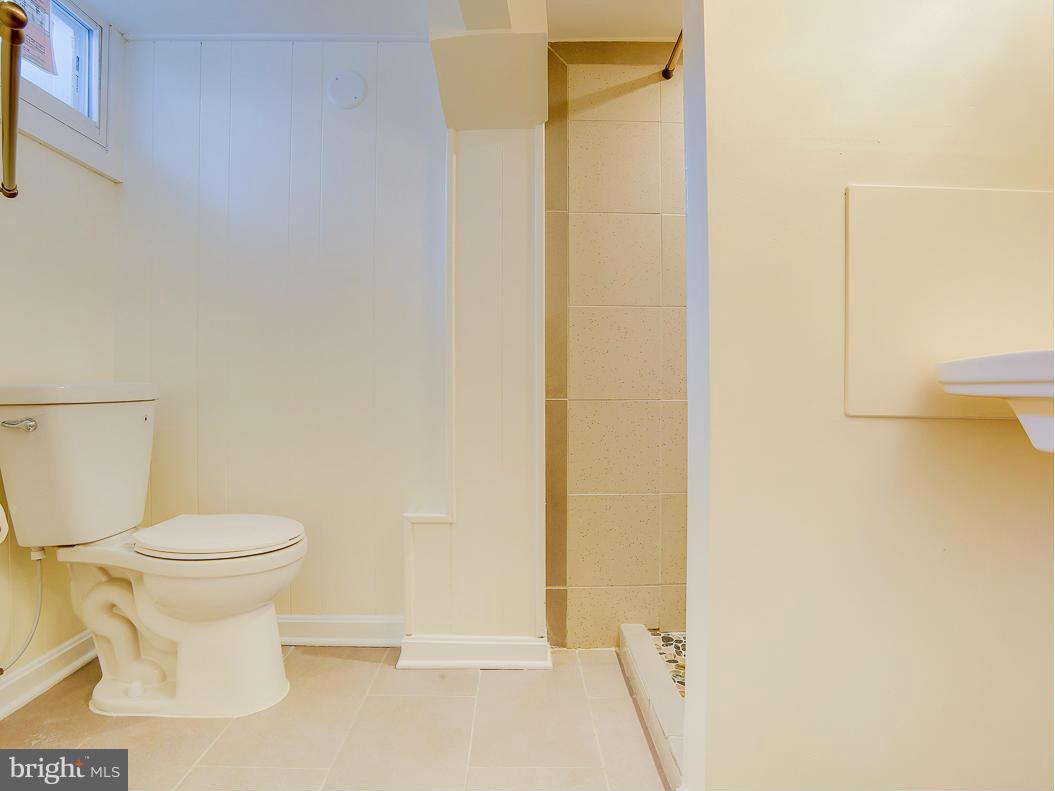 51 Hawthorne Road Middle River, MD 21220 - Photo 21 of 30 a bathroom with a toilet and a shower