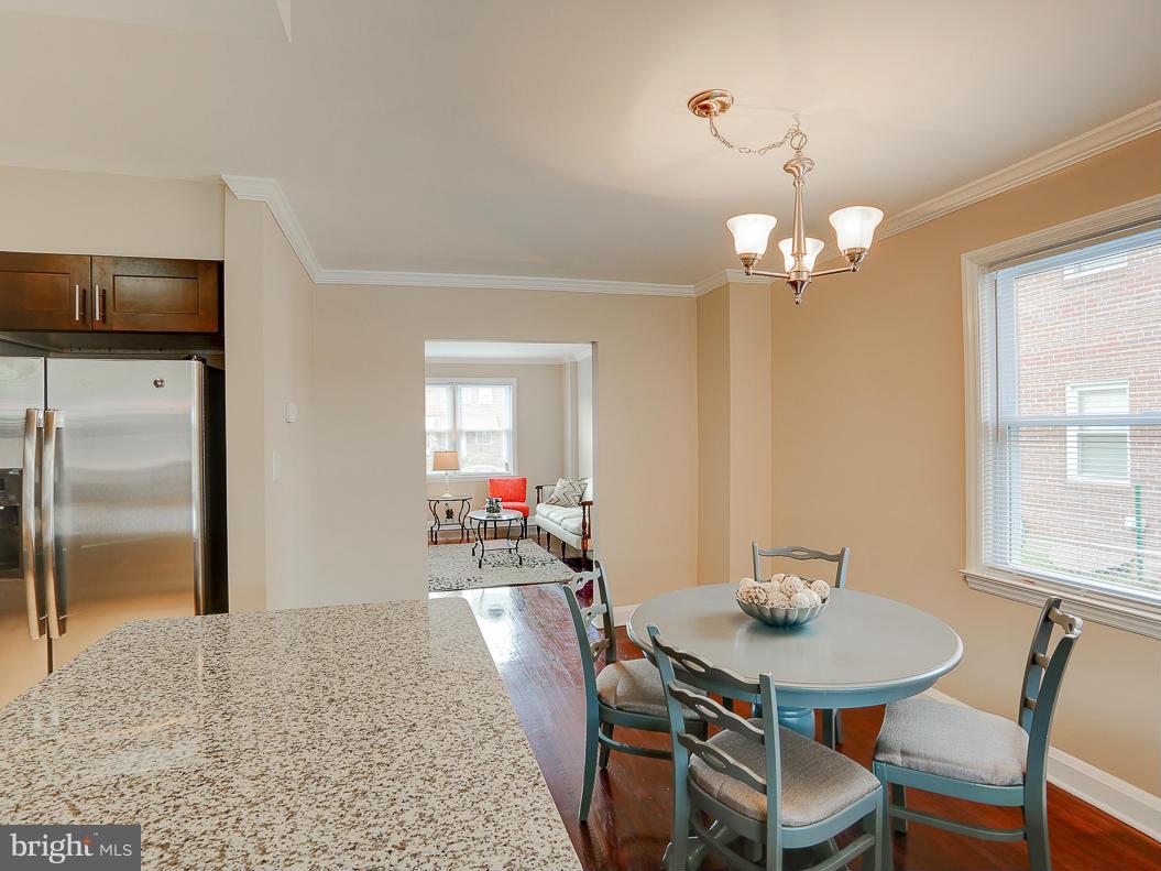 51 Hawthorne Road Middle River, MD 21220 - Photo 6 of 30 a view of a dining room with furniture and a chandelier
