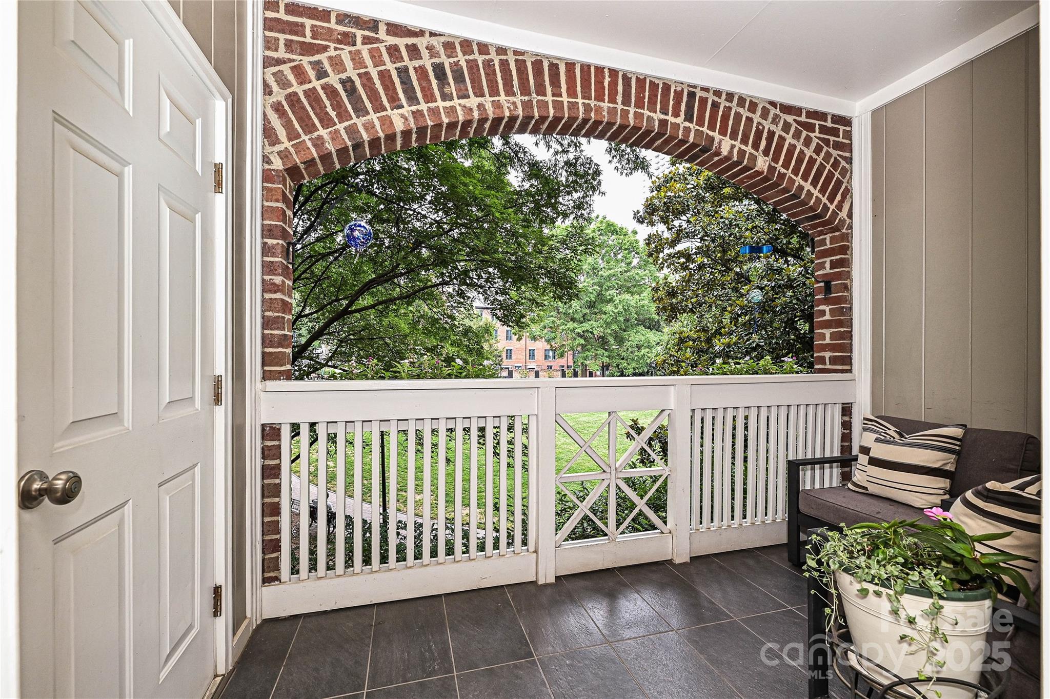 333 West 7th Street Charlotte, NC 28202 - Photo 20 of 46 a view of a porch with wooden floor